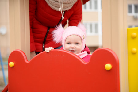 A child plays in the playground.の写真素材