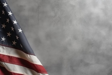 American flag on concrete wall background. Copy space for your text.の素材