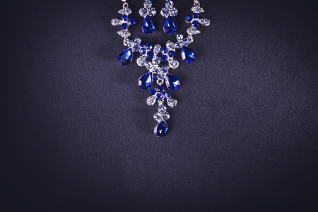 Jewelry on a dark blue backgroundの写真素材