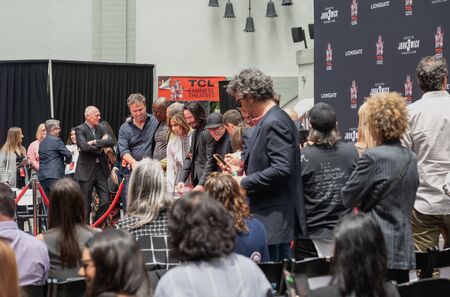 Keanu Reeves. Actor's Handprints and Footprints Cemented on Hollywood Boulevard. Chinese Theater Event, Guests, Celebrities, Halle Berry, Laurence Fishburne.  Hollywood, California, USA, May 14, 2019のeditorial素材