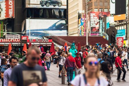 Times Square is an Iconic Street of New York City. Street View, Neon Art, Billboards, Traffic, Street Artists and Tourists. New York, May 24, 2019のeditorial素材