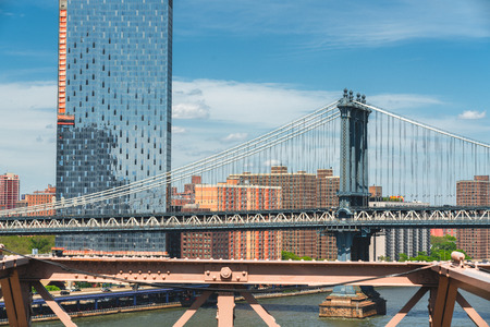 Manhattan Bridge and Manhattan Skyline view from Brooklyn Bridge, New York Cityの写真素材