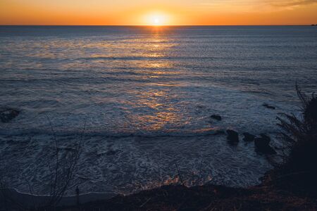 Beautiful sunset on the beachの写真素材