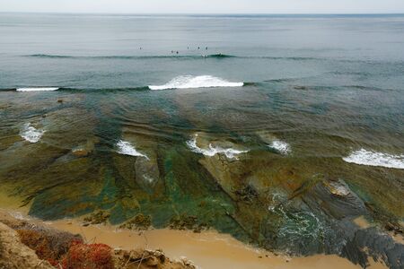 Aerial view ocean tide along the shore. Sunset Cliffs, Point Loma, San Diego, California.の写真素材
