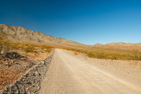 Road in desert. Death Valley National Park, Californiaの写真素材