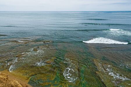Ocean tide along the shore. Sunset Cliffs, Point Loma, San Diego, California. Horizon over the ocean, Aerial View, Seascapeの写真素材