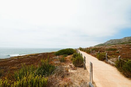 Bayside trail along the shore. San Diego peninsula, Point Loma. Cliffs and Ocean, Californiaの写真素材