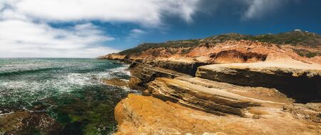 Cliffs and ocean. Awesome beach scene. Panoramic view Sunset Cliffs Natural Park at Point Loma in San Diego, Californiaの写真素材