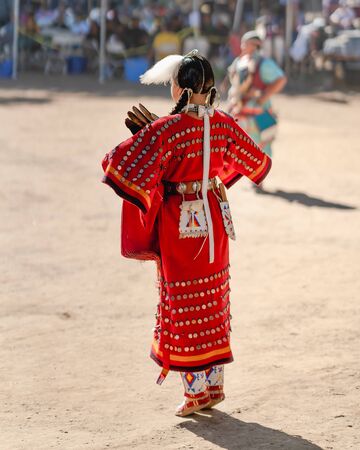 Live Oak Campground, Santa Barbara, CA/USA - October 5, 2019 2019 Powwow, woman dance. Native American Woman in Full Regalia. Santa Ynez Chumash Inter-Tribal Pow Wow. Woman performing.のeditorial素材