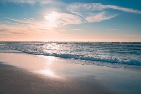 Tranquility scene, beautiful tropical beach sunset in pink and blue colors.の写真素材