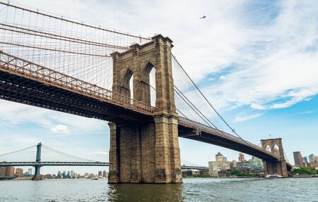 Brooklyn bridge over East River, Downtown Manhattan, New York Cityの写真素材