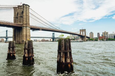 Brooklyn bridge and East River waterfront. Downtown Manhattan, New York Cityの写真素材
