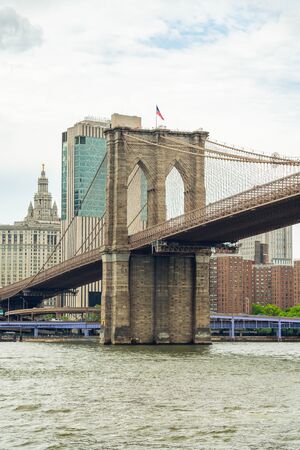 Brooklyn bridge over East River, Downtown Manhattan, New York Cityの写真素材