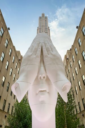New York City/USA-May 28, 2019
Rockefeller Center, Picture of Frieze Sculpture. Jaume Plensa - Behind the Walls. Fifth Avenue, Midtown of Manhattanのeditorial素材