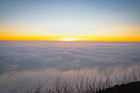 Marine layer above the Pacific Ocean at sunset. Aerial view, California Coastlineの写真素材