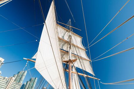 Old wooden ship. System of ropes, cables and chains, which support a sailing ship's mastの写真素材