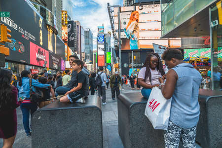 new York City/USA - May 24, 2019  Crowded Times Square, one of the world's most visited tourist...