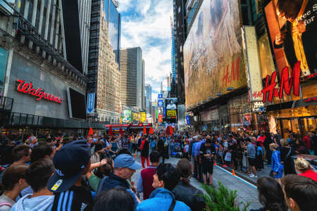 New York City/USA - May 24, 2019  Crowded Times Square, one of the world's most visited tourist attractions. Street view, architecture, bright billboards, touristsのeditorial素材