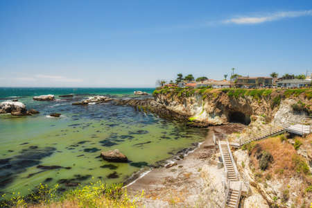 Pismo Beach, California/USA - May 15, 2020  Beach access at Pismo Beach, beautiful Central Coast of California. Breathtaking view of rocky cliffs at low tide.のeditorial素材