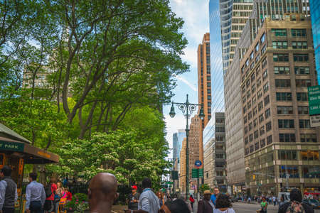 New York City/USA - May 24, 2019   Bryant Park, Also Known as Manhattan's Town Square, NYC. Surrounded by iconic skyscrapers, Bryant Park is visited by more than 12 million people each year.のeditorial素材