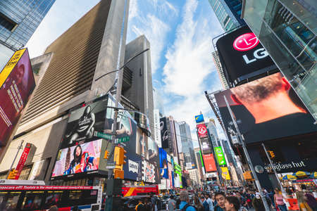 new York City/USA - May 24, 2019  Crowded Times Square, one of the world's most visited tourist attractions. Street view, architecture, bright billboards, touristsのeditorial素材