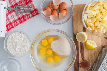 Apple cake recipe, ingredients for baking needs close up on kitchen tableの写真素材
