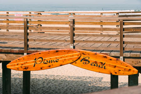 Pismo Beach sign on wooden boardwak. Pismo Beach pier, Central California coastの写真素材