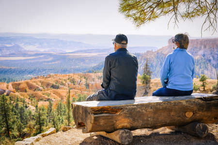 Bryce Canyon National Park, Utah. Mature age couple enjoys scenic viewの写真素材