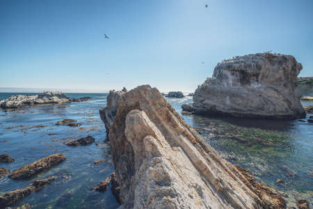 Rocky cliffs at low tide. Shell Beach, Pacific Coast, California