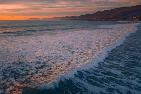 Golden sunset over the Pacific ocean. Pismo Beach, Californiaの写真素材