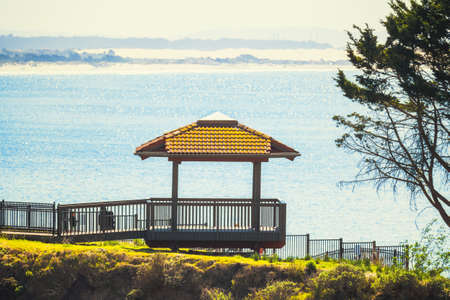 Gazebo overlooking the sea. Sunny day, romantic place