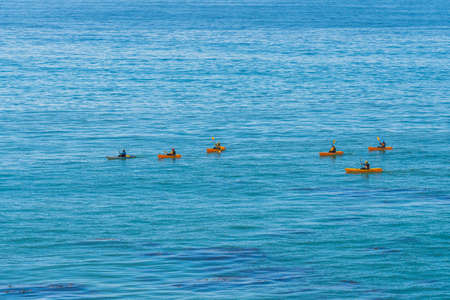 Pismo Beach, California, USA- March 1, 2021  Ocean kayaking. Group of people paddling kayaks along the Pacific ocean close to Pismo Beach, California Central Coastのeditorial素材