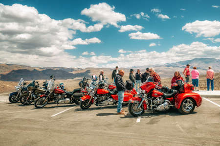 Death Valley, California, USA- April 14, 2021  Group of bikers in Death Valley, Ubehebe Crater Viewpoint. Extreme Sport, Active lifestyle, Adventure conceptのeditorial素材