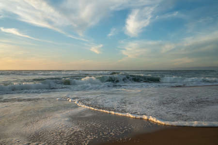 Pacific ocean and cloudy sky on background. Seascape, sunset over the seaの写真素材
