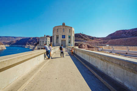 Hoover Dam, Nevada-Arizona, USA - October 2, 2021. Hoover Dam bypass bridge is open to traffic, and walkway is open to pedestriansのeditorial素材