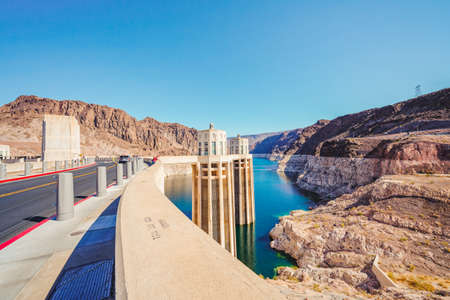Hoover Dam, Nevada-Arizona, USA - October 2, 2021 Hoover Dam bypass bridge is open to traffic, and walkway is open to pedestriansのeditorial素材