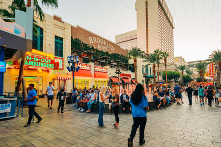 Las Vegas, Nevada, USA - October 1, 2021  Las Vegas city life at night. Walking people, restaurants, street viewのeditorial素材