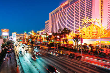Las Vegas, Nevada, USA - October 1, 2021  Flamingo, luxury Las Vegas Hotel and Casino. Classic Vegas style at the center of the Strip. Street view, traffic, city life at nightのeditorial素材