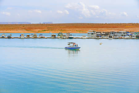 Lake Powell, Utah, USA - September 29, 2021 Lake Powell beach, and yachts and houseboats moored on lakeのeditorial素材