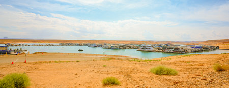 Lake Powell, Utah, USA - September 29, 2021 Lake Powell beach, and yachts and houseboats moored on lake, panoramic viewのeditorial素材
