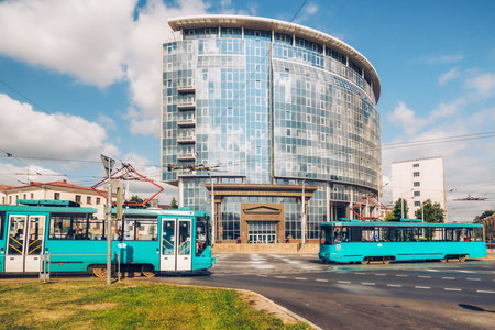 Minsk, Belarus - August 27, 2021  Belarusian State University building, downtown of the city. Modern architecture, traffic, city lifeのeditorial素材