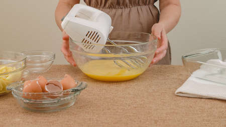 Apple cake with biscuit base recipe, step by step baking process. Ingredients close up on kitchen...