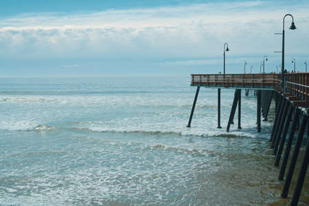 Pismo Beach pier and ocean view, cloudy overcast day, California Central Coast