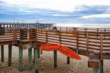 Pismo Beach, California, USA - March 3, 2022.  Pismo Beach pier, and wooden boardwalk in the heart of Pismo Beach city, Californiaのeditorial素材