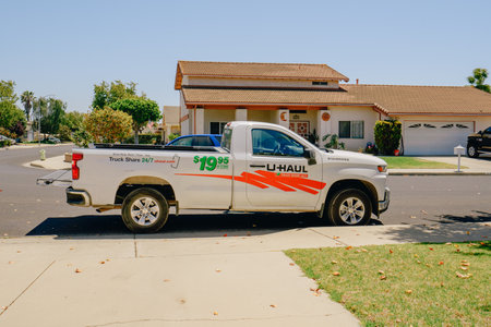 Santa Maria, California, USA-June 29, 2022.  U-Haul rental truck parked on the street close to the...