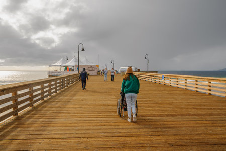Pismo Beach, California - December 6, 2022.  Pismo Beach pier, an old wooden pier in the heart of Pismo Beach city, Californiaのeditorial素材