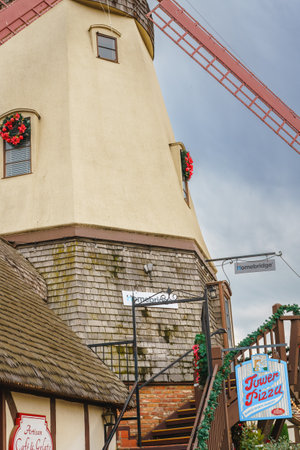 Solvang, California, USA - December 8, 2022  Windmill in Solvang, Tower Pizza on Main Street. Architecture, street view, traditional Danish Style, little Denmark in Californiaのeditorial素材