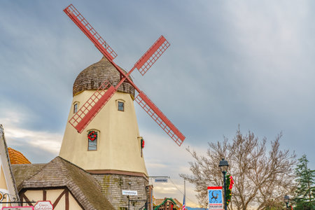 Solvang, California, USA - December 8, 2022  Windmill in Solvang, Tower Pizza on Main Street. Architecture, street view, traditional Danish Style, little Denmark in Californiaのeditorial素材