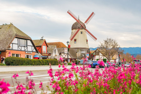 Solvang, California, USA - December 8, 2022  Windmill in Solvang, Tower Pizza on Main Street. Architecture, street view, traditional Danish Style, little Denmark in Californiaのeditorial素材