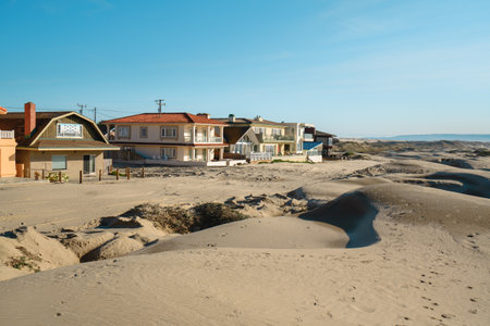 Oceano, California, USA - December 14, 2022. Houses that are set amid coastal sand dunes. Beautiful houses with ocean views in a small beach townのeditorial素材
